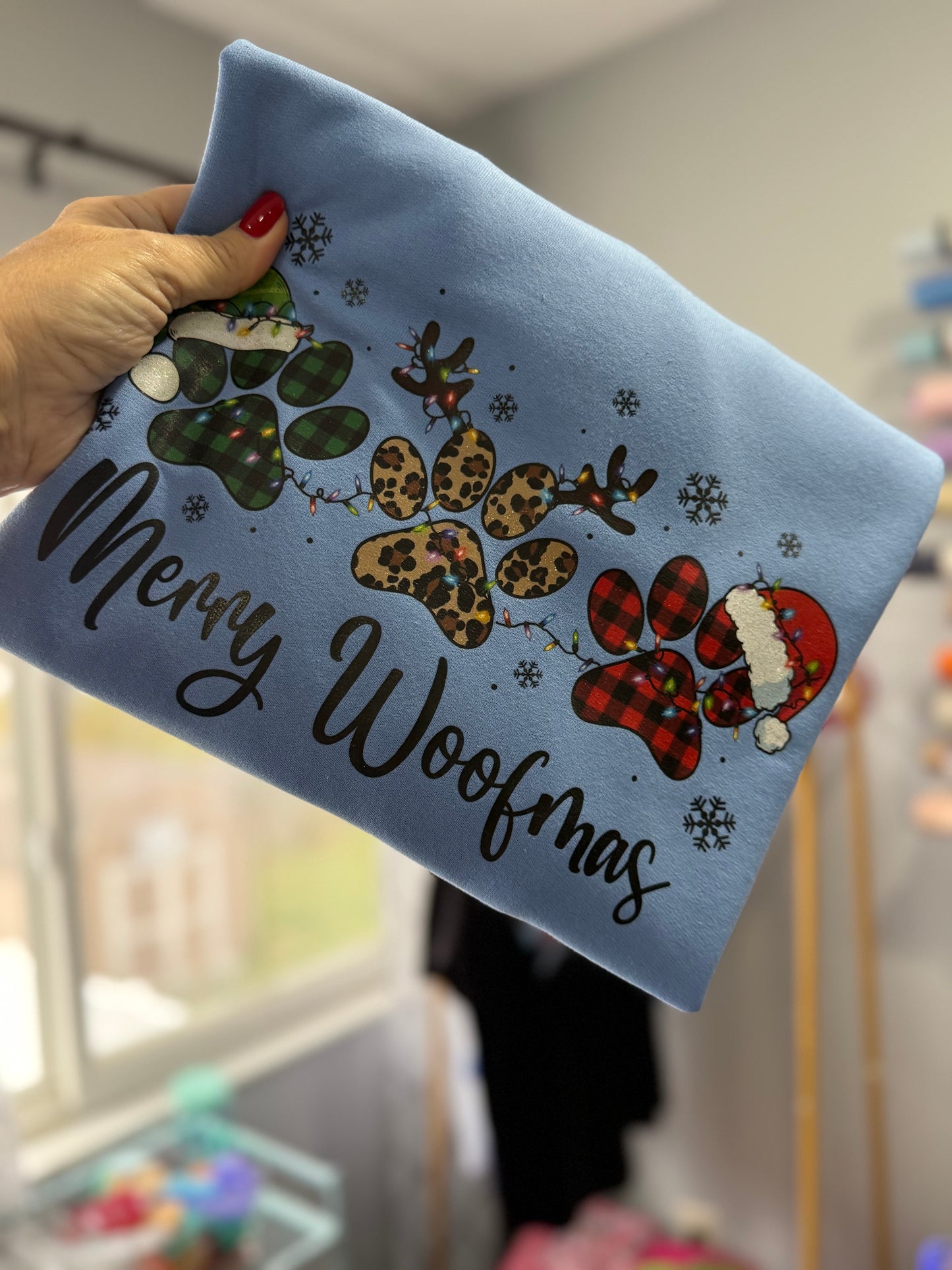 Merry Woofmas pawprint crewneck sweatshirt