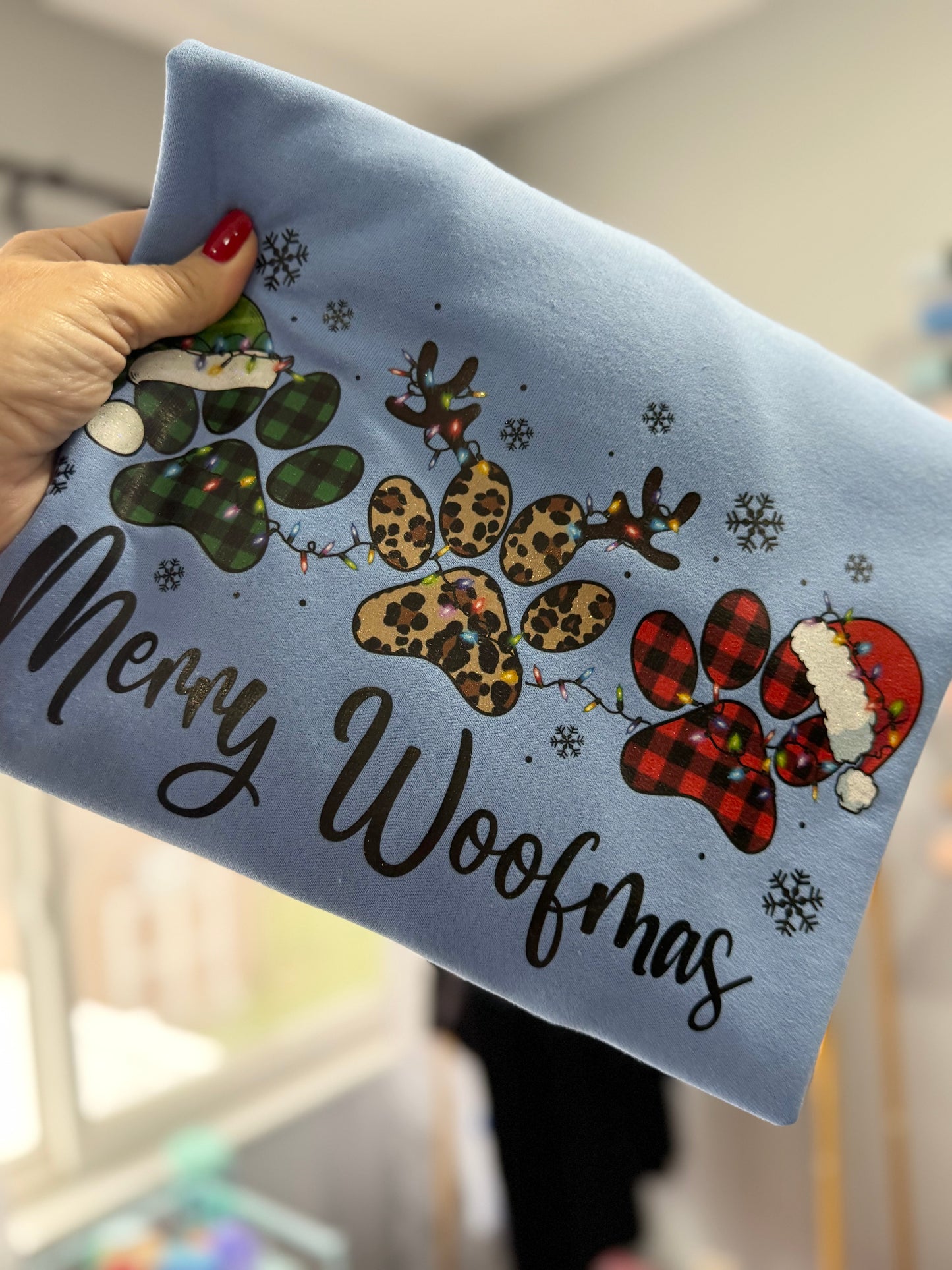 Merry Woofmas pawprint crewneck sweatshirt